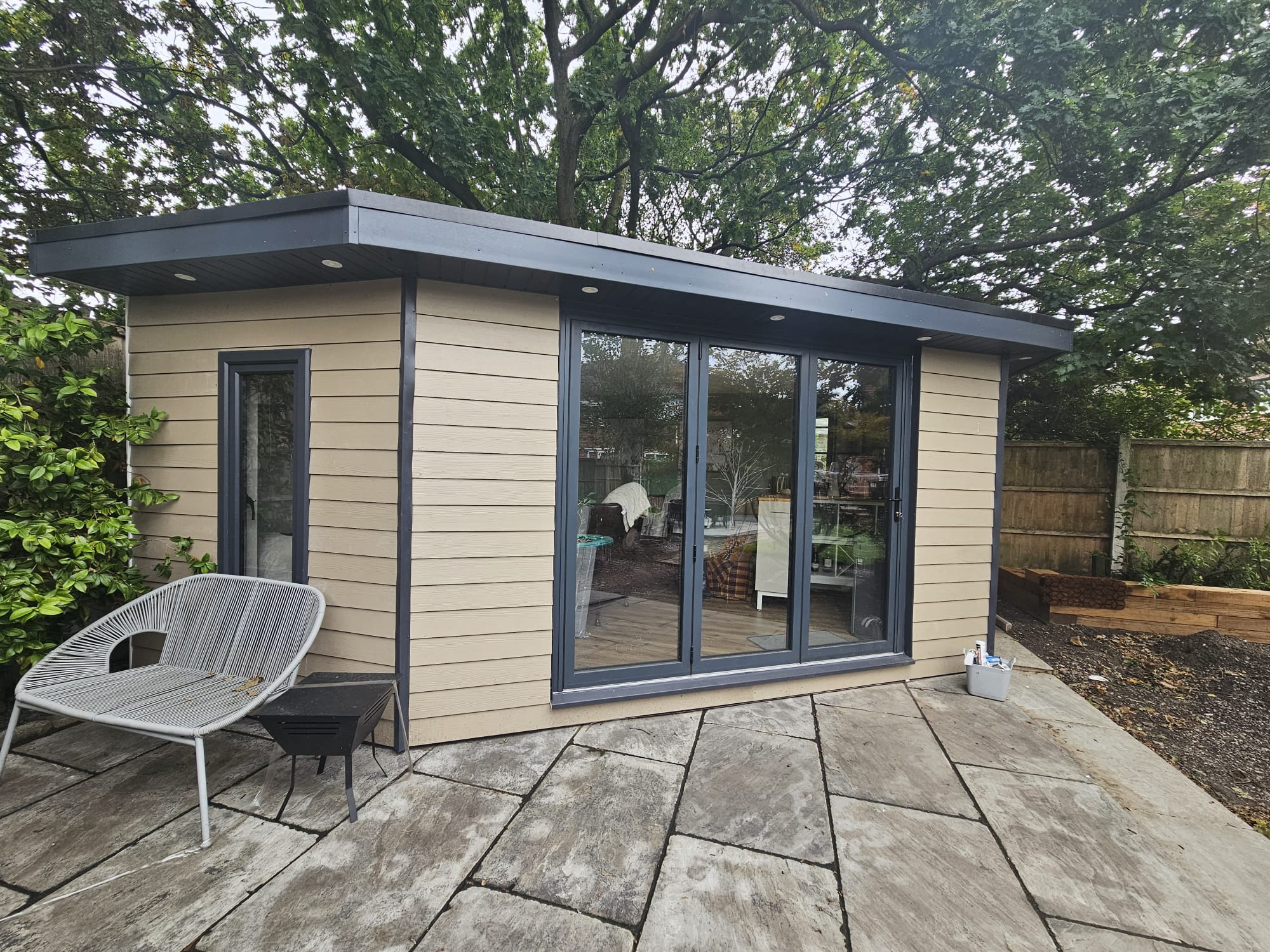 cream and black modern garden room